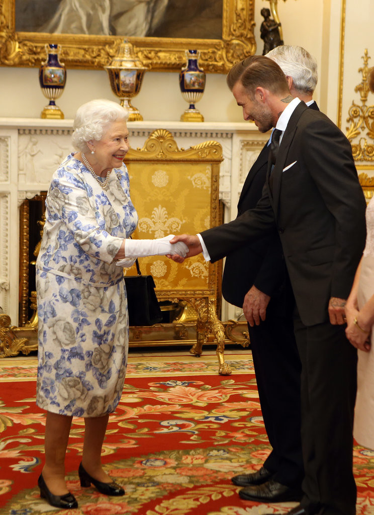PHOTO: Queen Elizabeth and David Beckam. Photo Credits: Getty Images