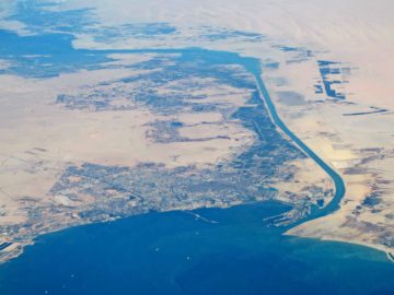 Aerial_view_of_city_of_Suez_and_Suez_Canal