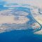 Aerial_view_of_city_of_Suez_and_Suez_Canal